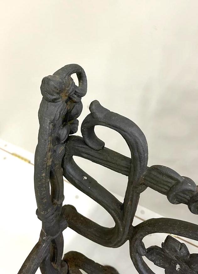 A Victorian possibly Coalbrookdale cast iron ivy pattern garden bench, length 147cm, depth 52cm, height 89cm